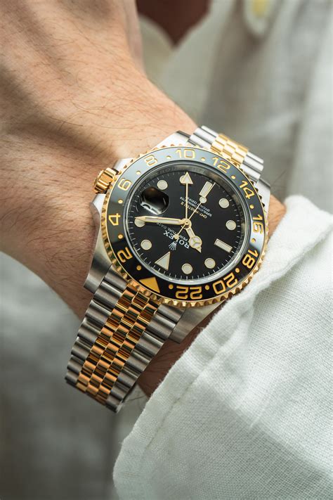 rolex gmt master ii black and gold price|rolex gmt sprite retail price.